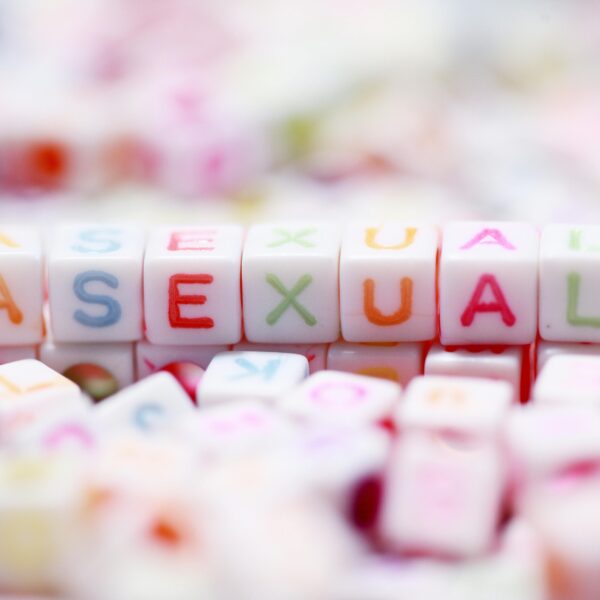 Colorful letter blocks spelling 'asexual' representing LGBTQ pride and identity.
